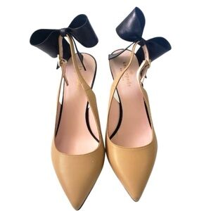 Kate Spade Jax Nude and Black Bow heels.  New without box. Size 8.5
